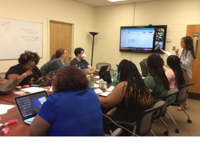 Team/teachers engaging in a team content meeting